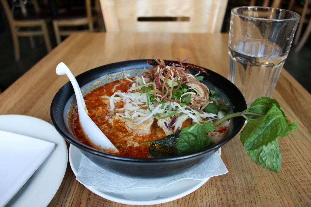 Chicken mee kathi ($15) is a noodle dish that captivates with rich spices at Thip Khao. 