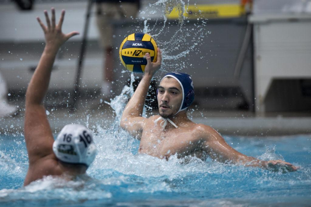 Junior utility player Atakan Destici looks to pass the ball in a game against La Salle at the Navy Open over the weekend. 
