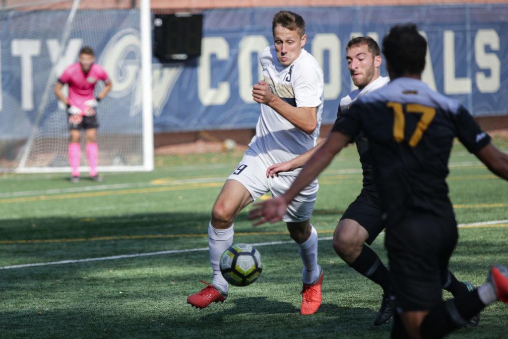 Junior midfielder Colin Anderson attempts to take possession of the ball during Saturdays game against VCU.