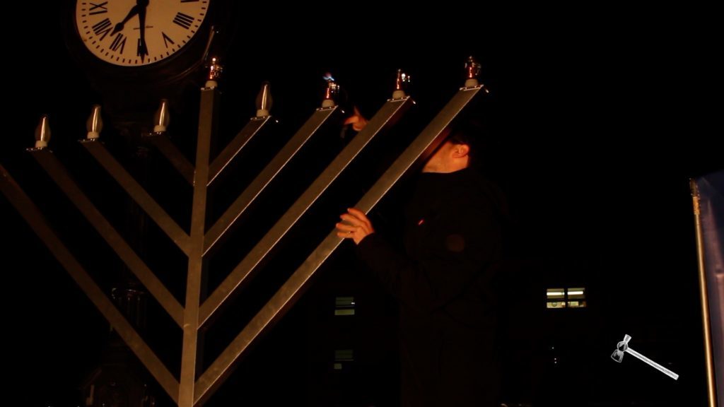 Chabad Colonials hold a menorah lighting ceremony to celebrate Hanukkah
