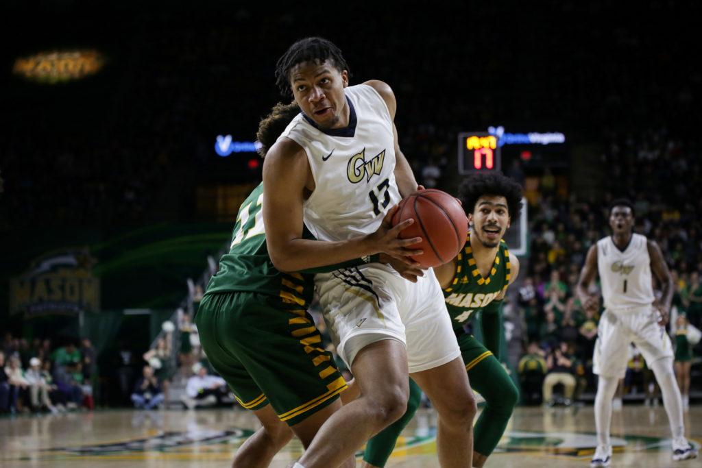 Redshirt junior guard DJ Williams drives to the basket in a game against George Mason Saturday.