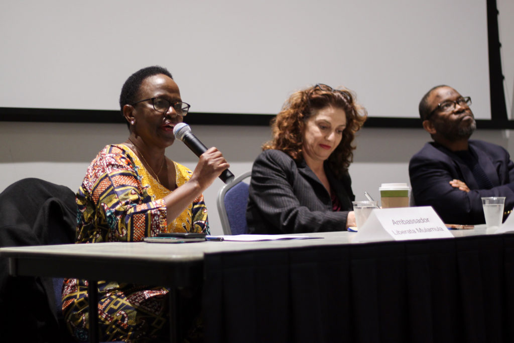 From left: Liberata Mulamula, a former Tanzanian ambassador to the United States; Fran Buntman, a sociology professor; and Xolela Mangcu, a sociology professor, discuss the merits of the Colonials nickname at a Marvin Center event Wednesday.