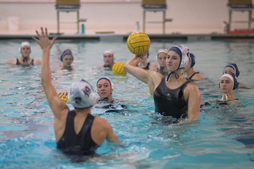 Sophomore utility player Alana Ponce takes a shot during a womens water polo practice Wednesday. 