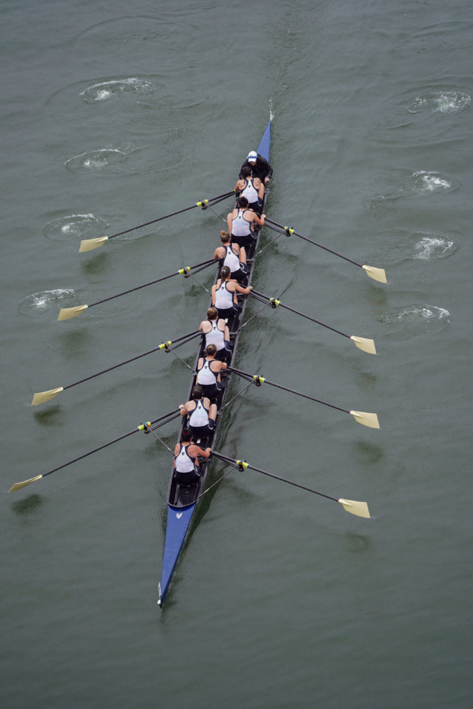 The womens rowing team sits in the boat during the GW Invite Saturday.