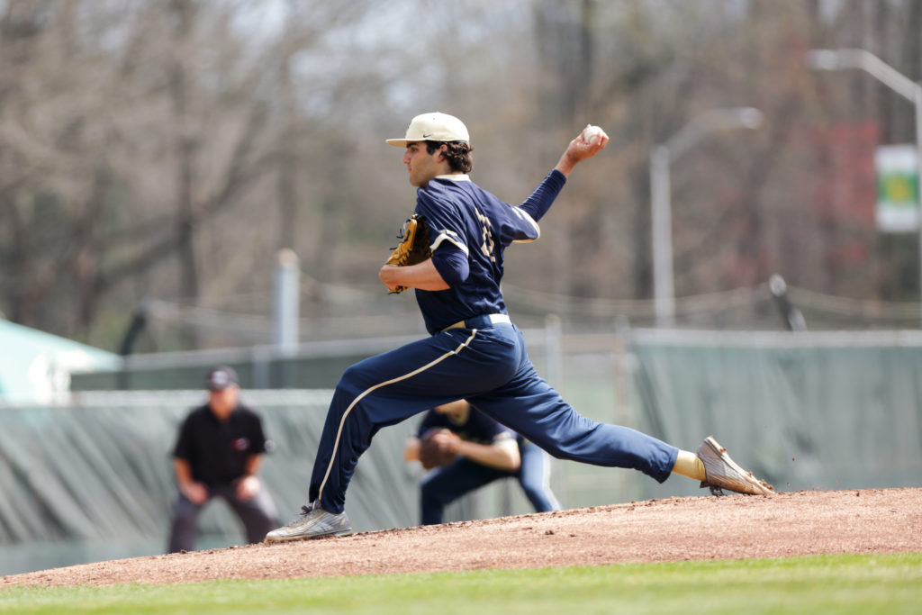 Junior pitcher Elliott Raimo pitches during a game against George Mason in April.
