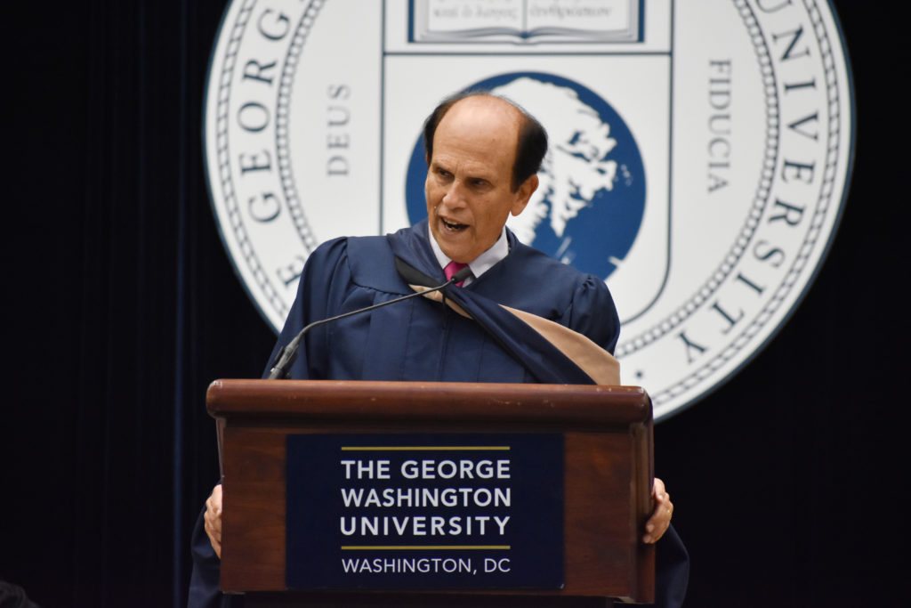Philanthropist Michael Milken, who donated to the Milken Institute School of Public Health, addressed about 300 graduates in the School of Business Thursday.