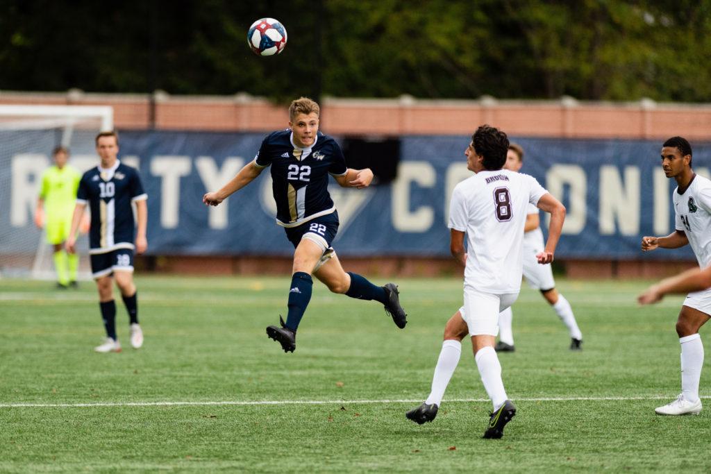 German graduate student midfielder and defender Sandro Weber heads the ball during Saturdays game against Brown. 