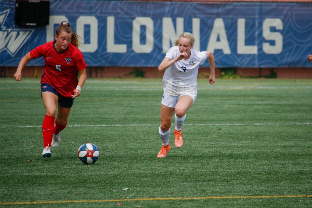 Defense Hannah Zaluski chases after the ball during Thursdays game against Liberty University.  The Colonials beat the Eagles 3–2.