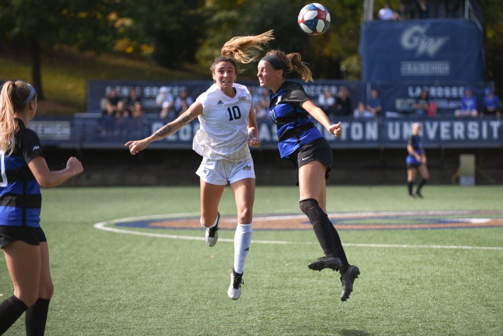 Midfielder Kelly Amador heads the ball during the game against Saint Louis University Sunday. The Colonials fell to the Billikens 1–2, ending in second place in the A-10.