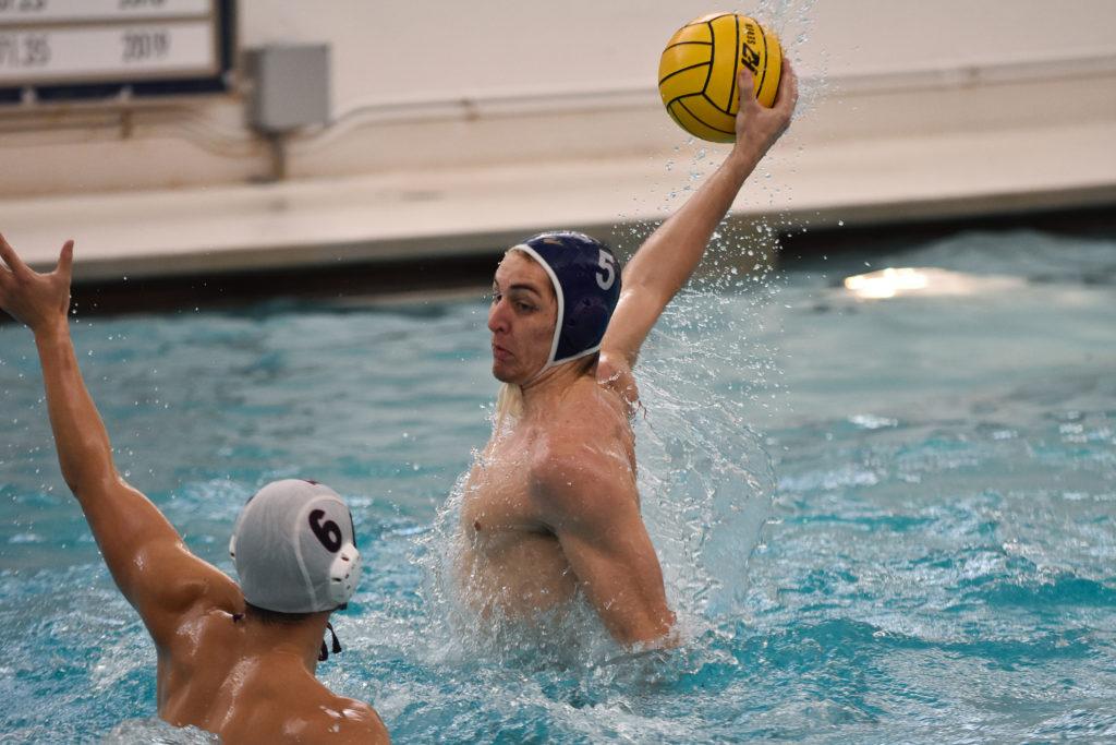 Sophomore utility player DJ Davis takes a shot that helped set up the Colonials with a winning record heading into the Mid-Atlantic Water Polo Conference Championships. 