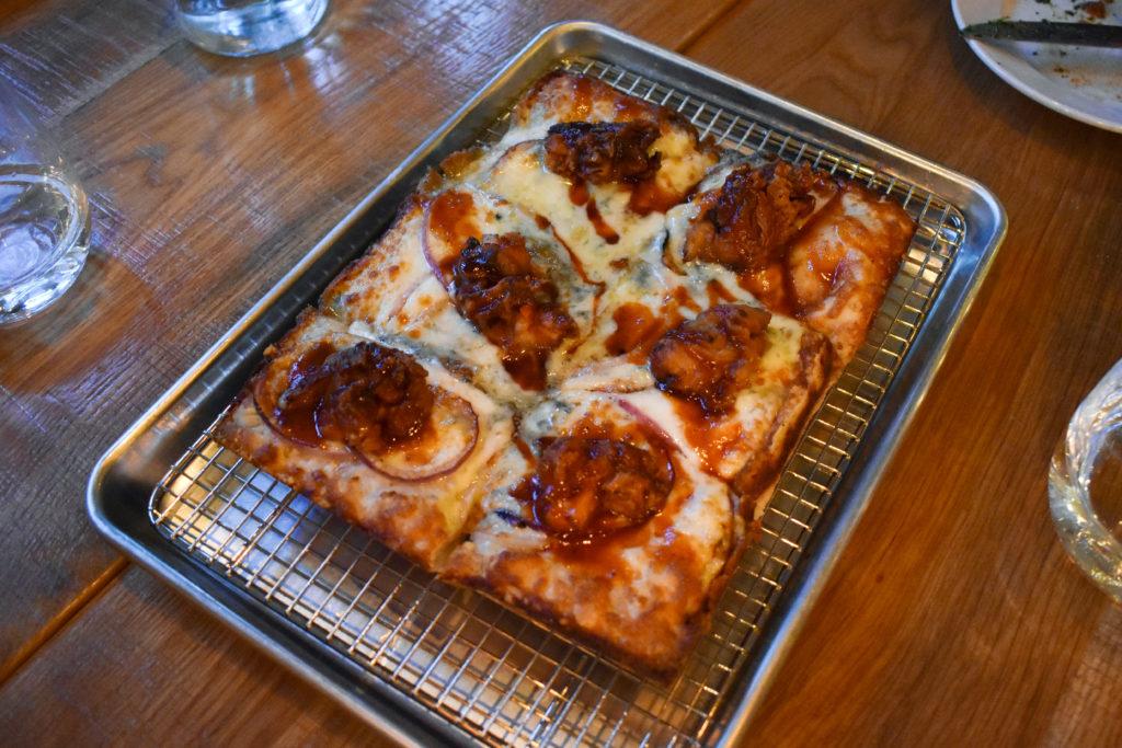 Emma Squared serves up classic Detroit-style pizza, complete with fluffy dough and a cheesy crust. 
