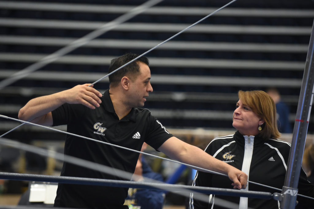 Gymnastics volunteer assistant coach Justin Watson has worked with the program for 15 years. 