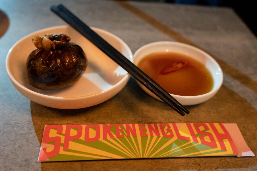 At Spoken English, you can order a dumpling wrapped in fried chicken skin. 