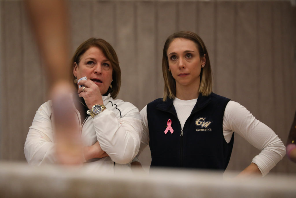 Stephanie Stoicovy Worrell, an assistant coach for gymnastics, competed with the squad before joining the coaching staff. 