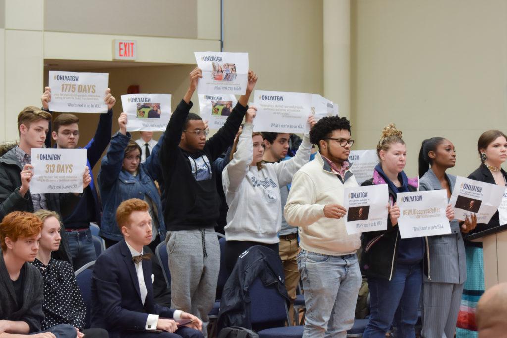 Students at the Board of Trustees meeting Friday protested the University's investments in the fossil fuel industry. 