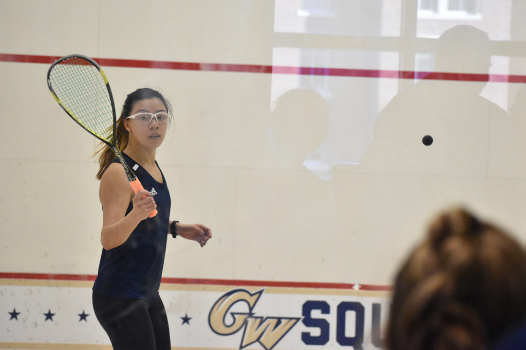 Nikki Pang waits to rally the ball in her match Friday.
