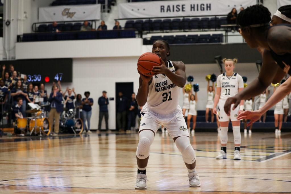 Redshirt freshman forward Mayowa Taiwo sets herself up for a free throw in a game against Richmond Tuesday. The Colonials fell to the Spiders to drop out of the A-10 Conference. 