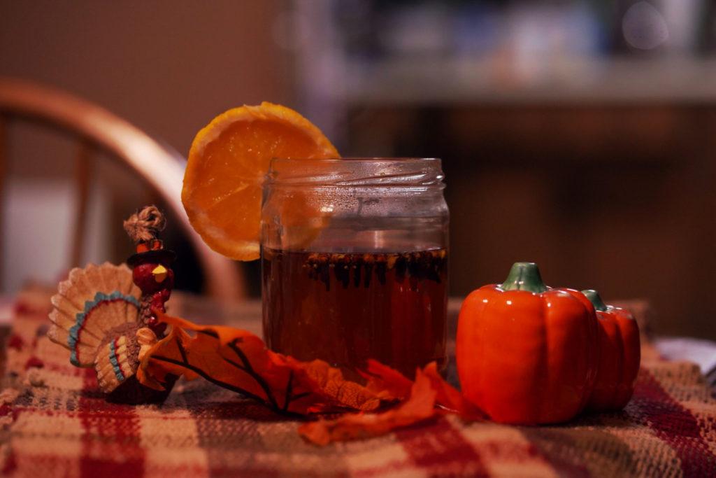 The chai hot toddy requires one cup of chai, a dash of bourbon and honey, with orange slices and whole cloves to garnish.