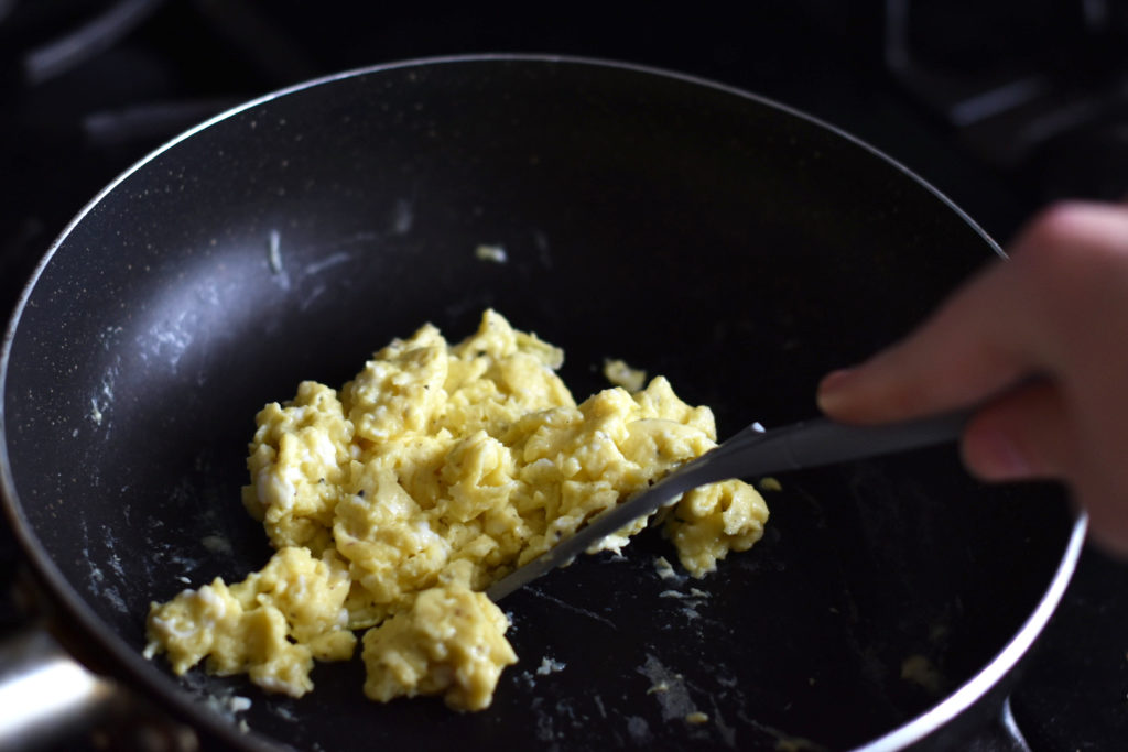 To replicate the creamy scrambled eggs in the movie 