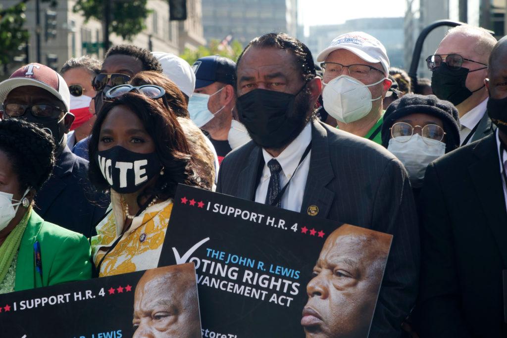 Protesters marched to the National Mall, where they heard from politicians and voting rights activists.