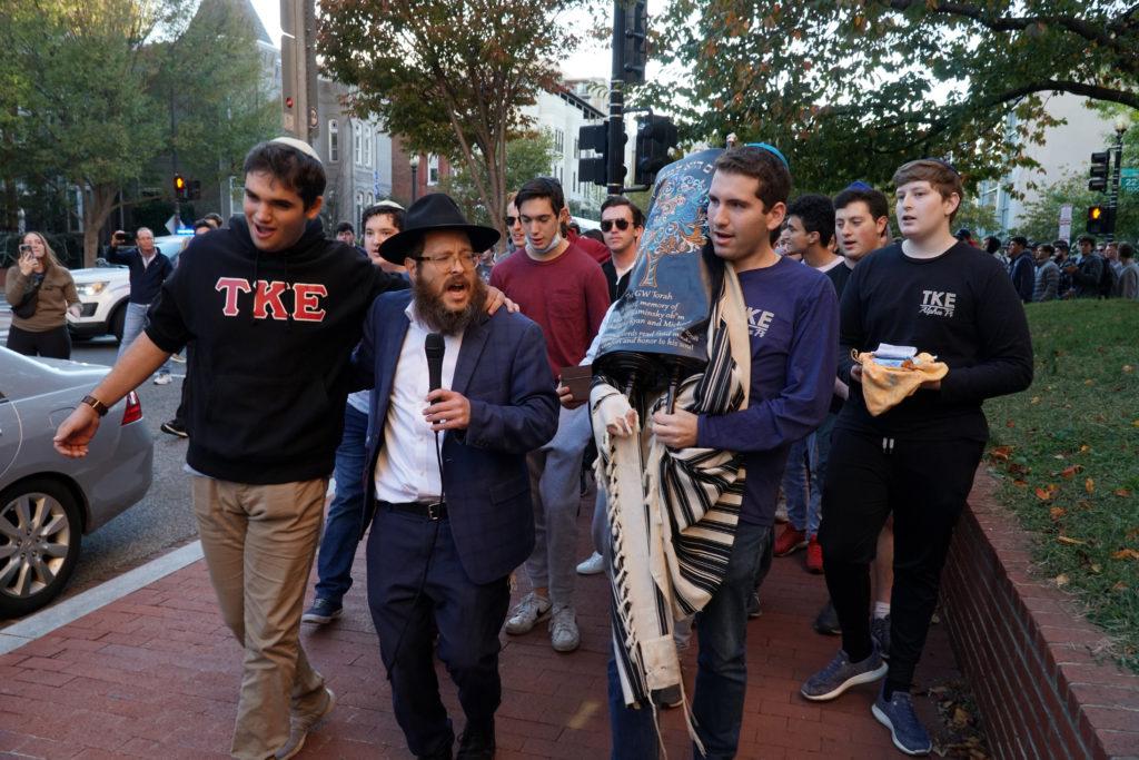 About 400 students processed through campus last Monday after news spread about the desecration of a Torah scroll at Tau Kappa Epsilon’s on-campus house. 