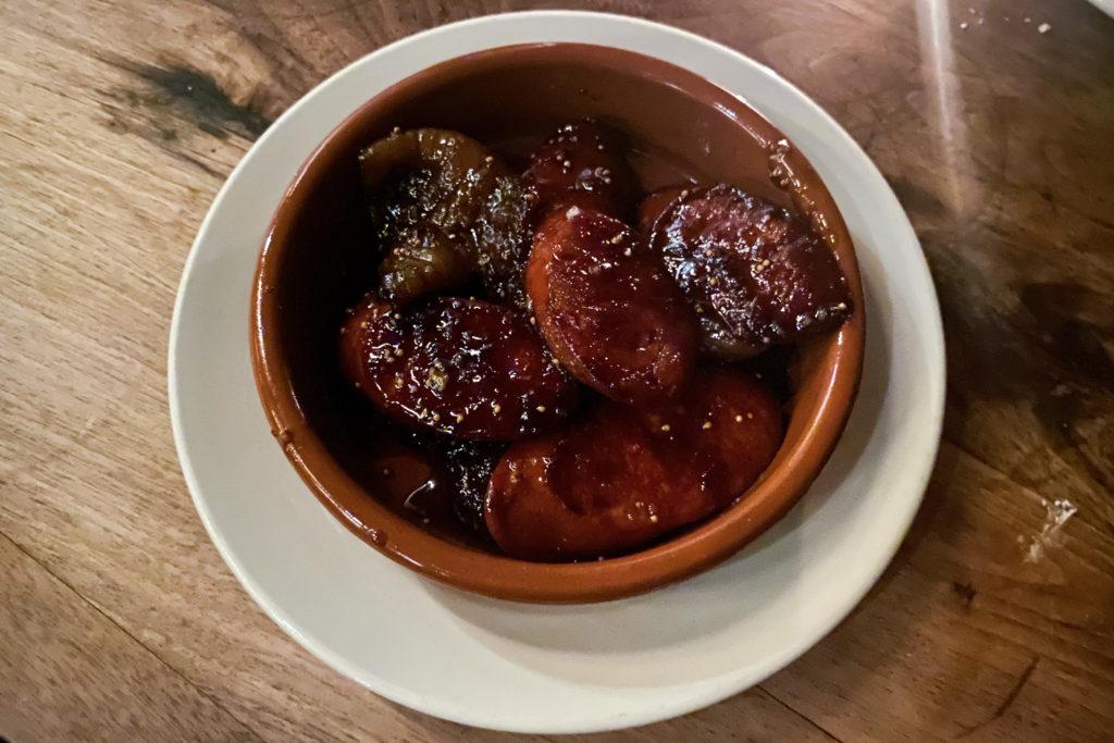 Barcelona+Wine+Bars+chorizo+is+cut+into+oval+medallions%2C+which+are+charred+and+tossed+together+with+braised+figs.