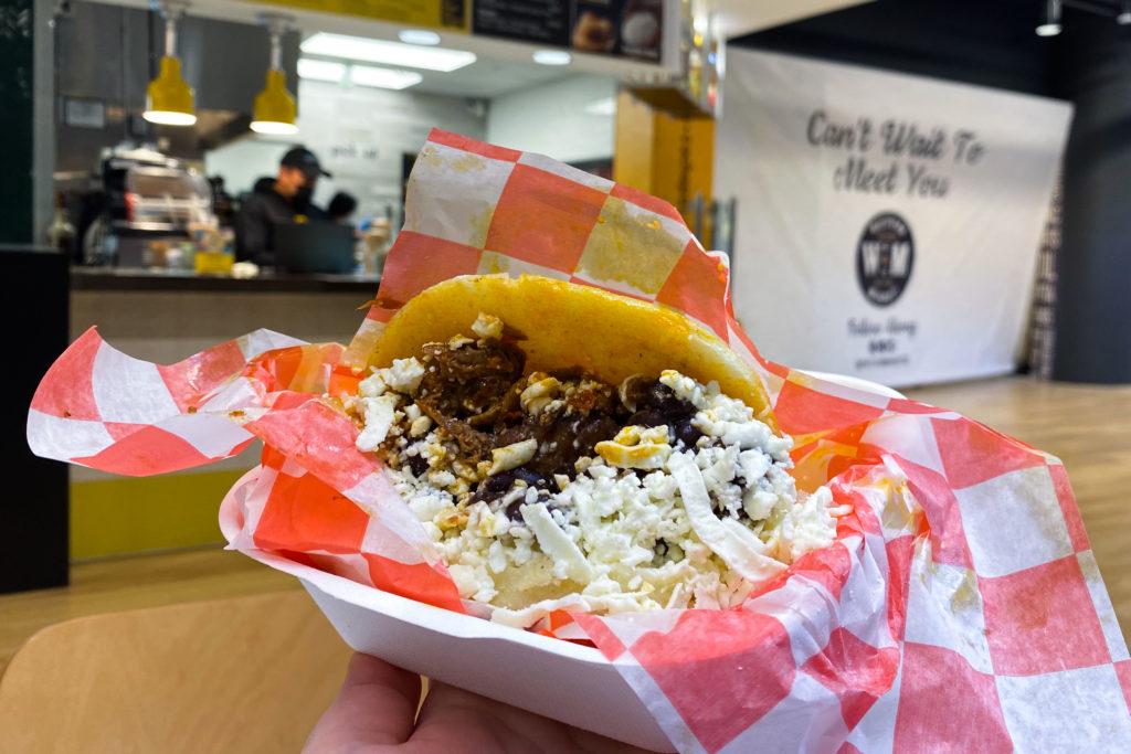 The pabellón arepa is loaded with shredded beef, queso fresco, black beans and sweet plantains.