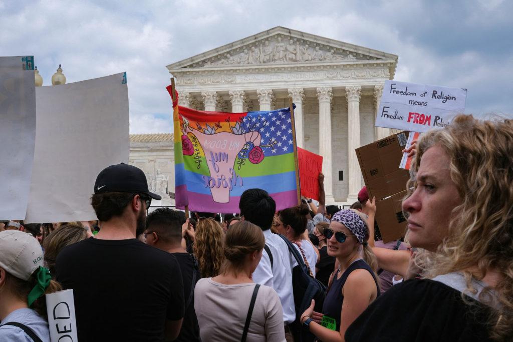 Thousands protested outside the Supreme Court Friday after they released their decision to overturn Roe v. Wade, rolling back federal abortion protections. 