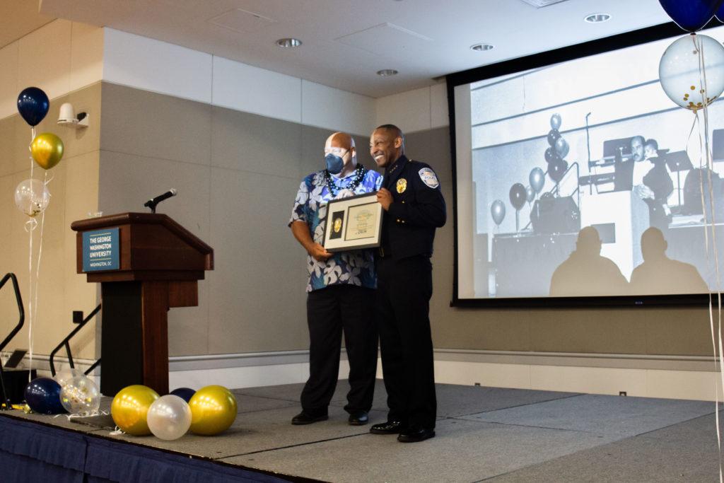 During a retirement ceremony in the University Student Center Tuesday, GW community members celebrated Michael Tapscott’s legacy as the director of the Multicultural Student Services Center since 2003.