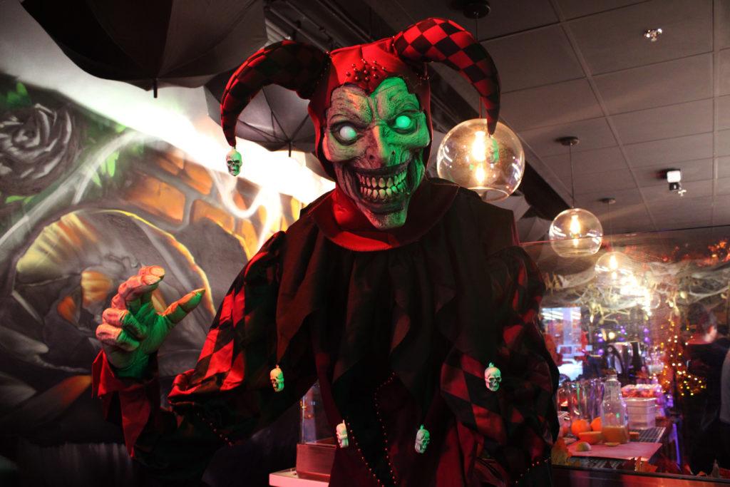 Statues of jesters, clowns and goblins enhance every crevice of the restaurant and spiderwebs and skeletons coat the walls of the dimly lit dining room. 