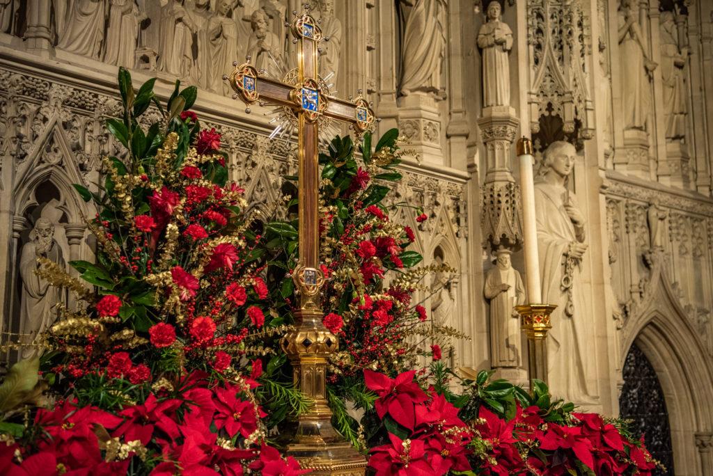 Starting the week before Christmas, the entire Cathedral is covered in bright red flowers, greens and Christmas wreaths.