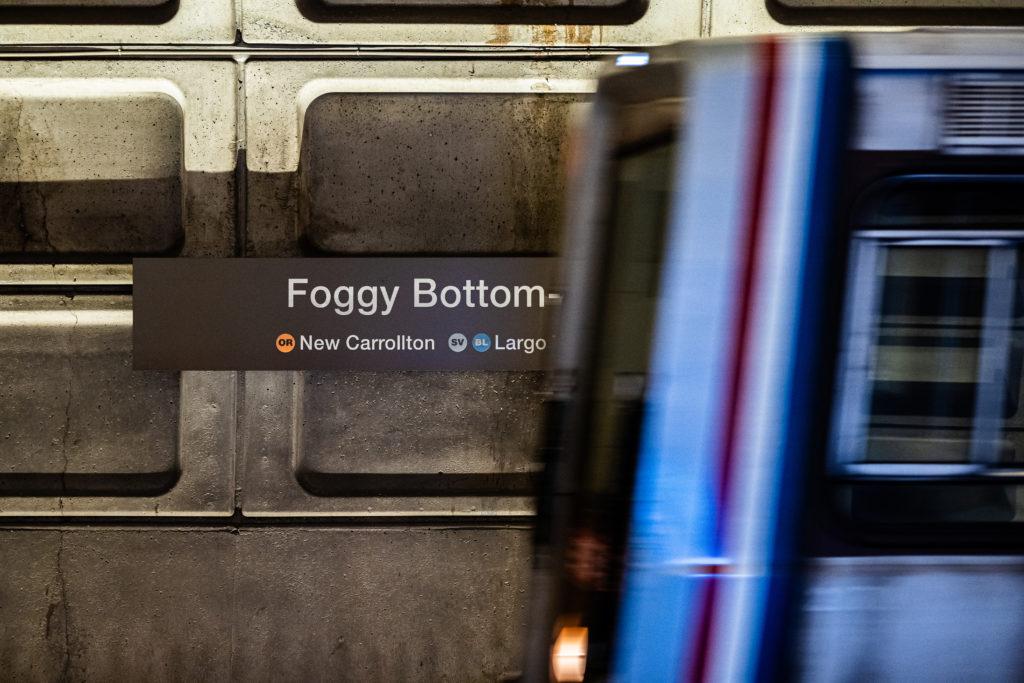 A train pulls into the Foggy Bottom-GWU Metro station.