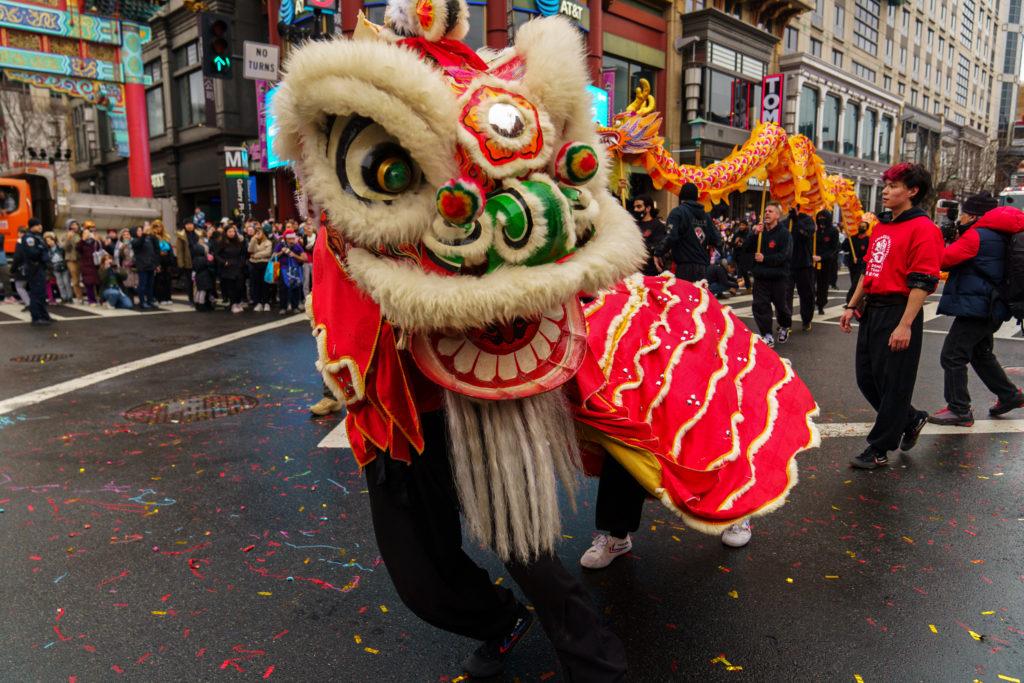 A group performs a dragon dance at the annual Lunar New Year Parade in Chinatown Sunday, which drew hundreds of people to celebrate the beginning of the Year of the Rabbit.