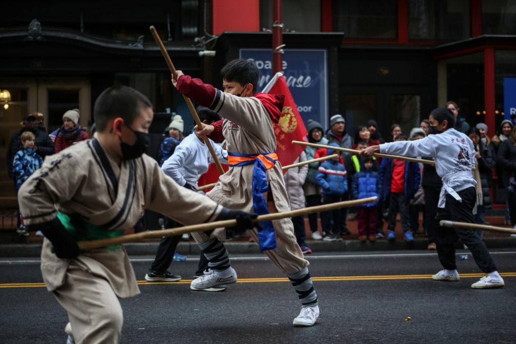 The Shaolin Temple Kung Fu School participates in the parade procession.