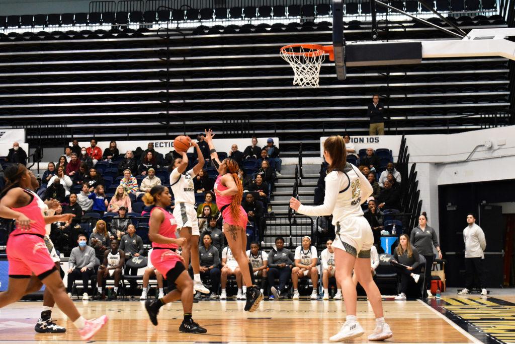 Senior guard Essence Brown pulls up from midrange for a jump shot.