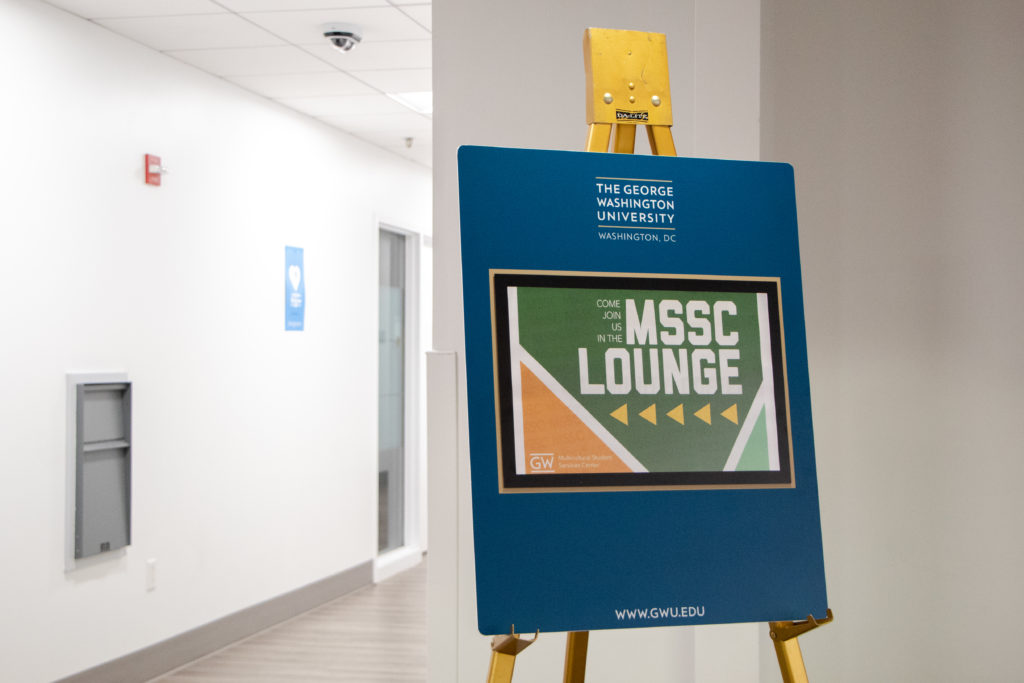A sign welcomes students to the GW Multicultural Student Services Centers fifth-floor lounge. 