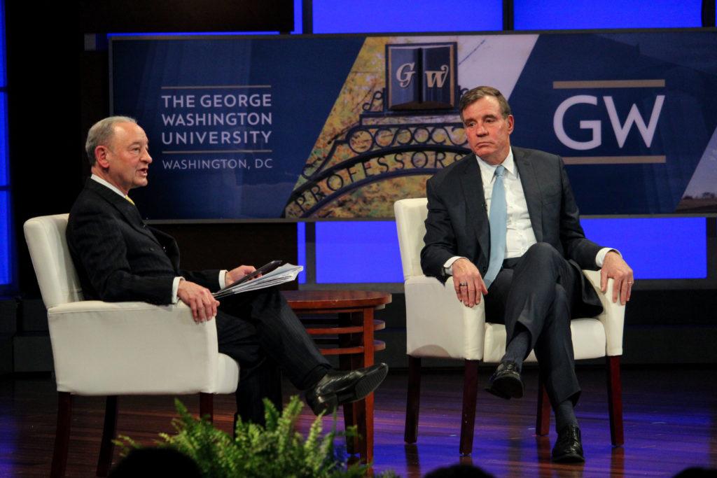 Sen.+Mark+Warner%2C+D-VA%2C+a+GW+alumnus%2C+discussed+the+intersection+of+cybersecurity+and+health+care+with+interim+University+President+Mark+Wrighton+at+the+forum+Tuesday.