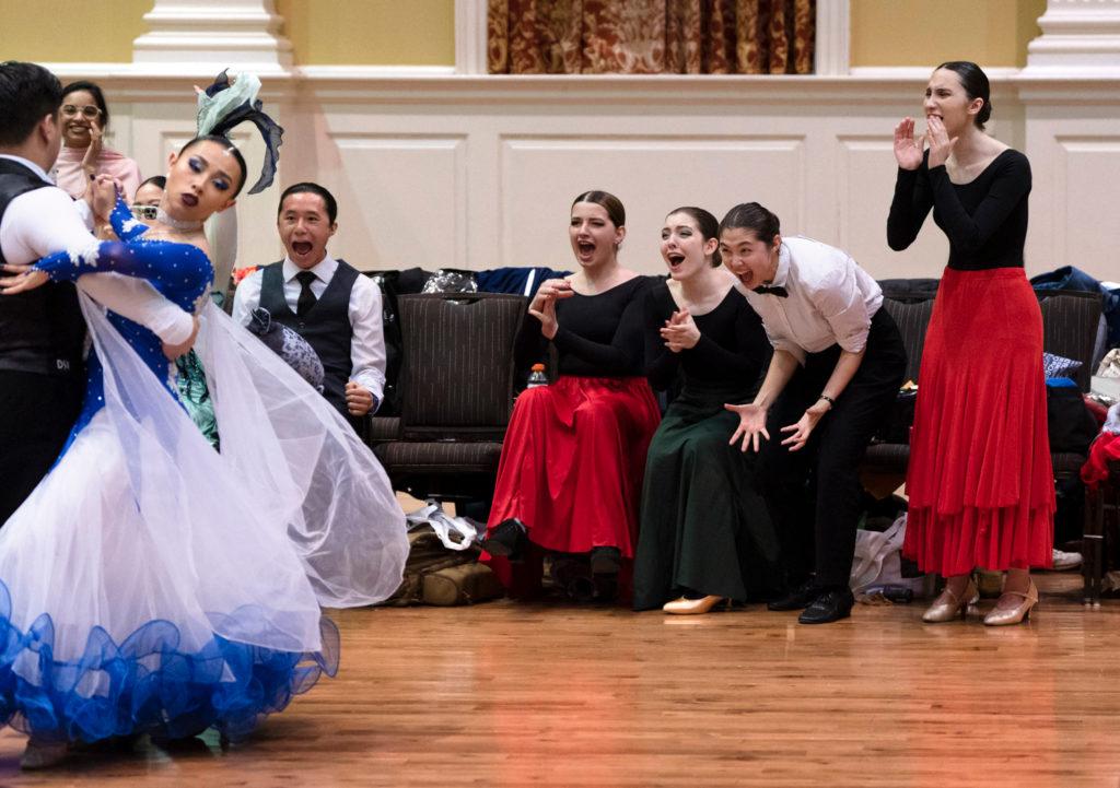 Sean Tam, Olivia Frankiewicz, Emma Taylor, Lucia Kustra and Laura Boci (left to right) cheer on Steven Qi and Mikaila Loughlin during a dance.
