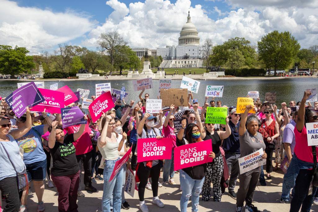 Set against the backdrop of the U.S. Capitol building, abortion rights activists gathered Saturday to rally support after the court blocked restrictions against mifepristone, a pill used for abortions.