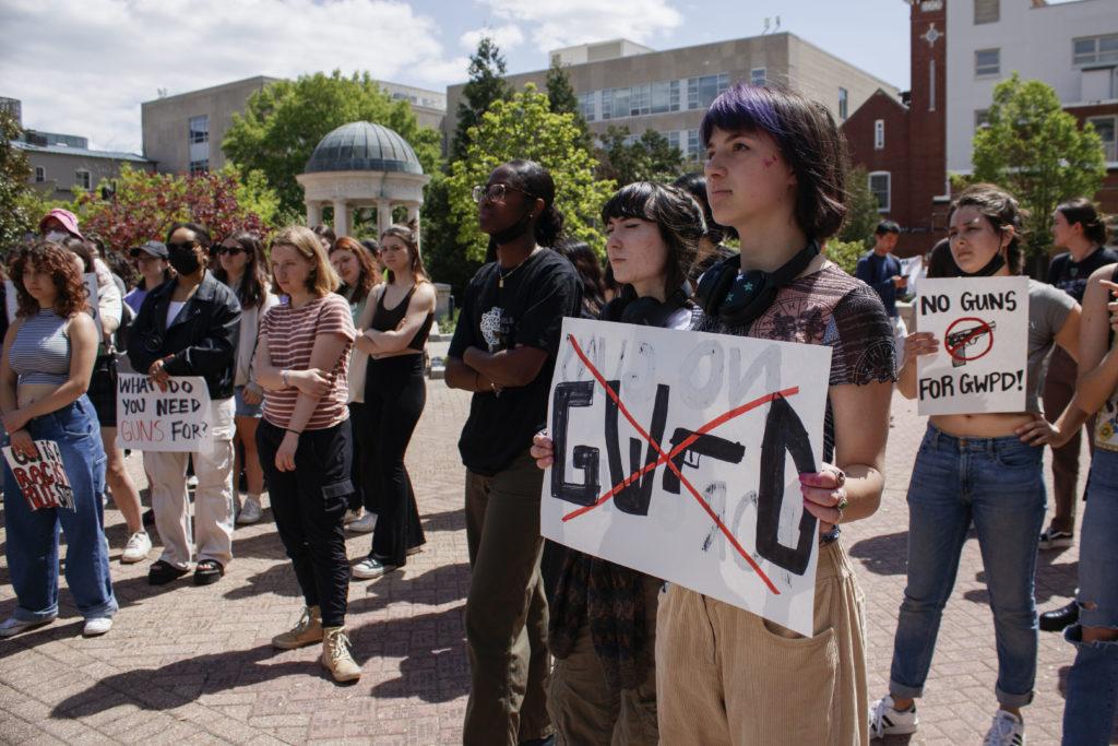 Students protest officials decision to arm GWPD officers in April.