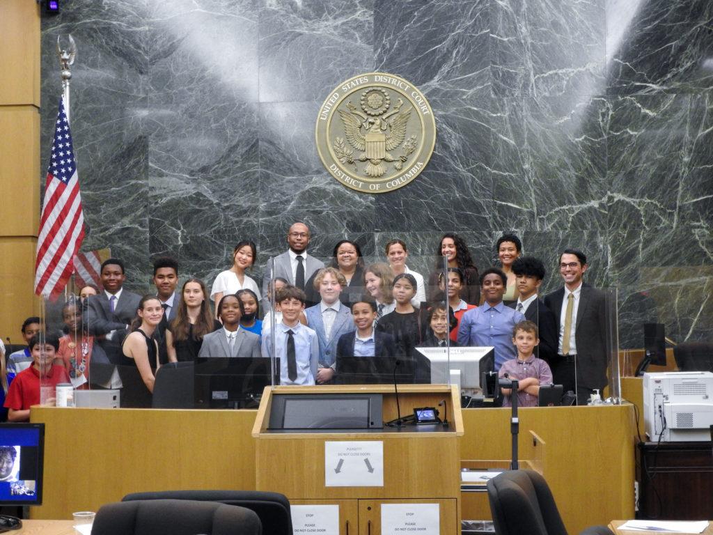Stuart+Hobson+Middle+School+students+pose+for+a+photo+in+the+D.C.+District+Court+after+completing+their+mock+trial+Monday.