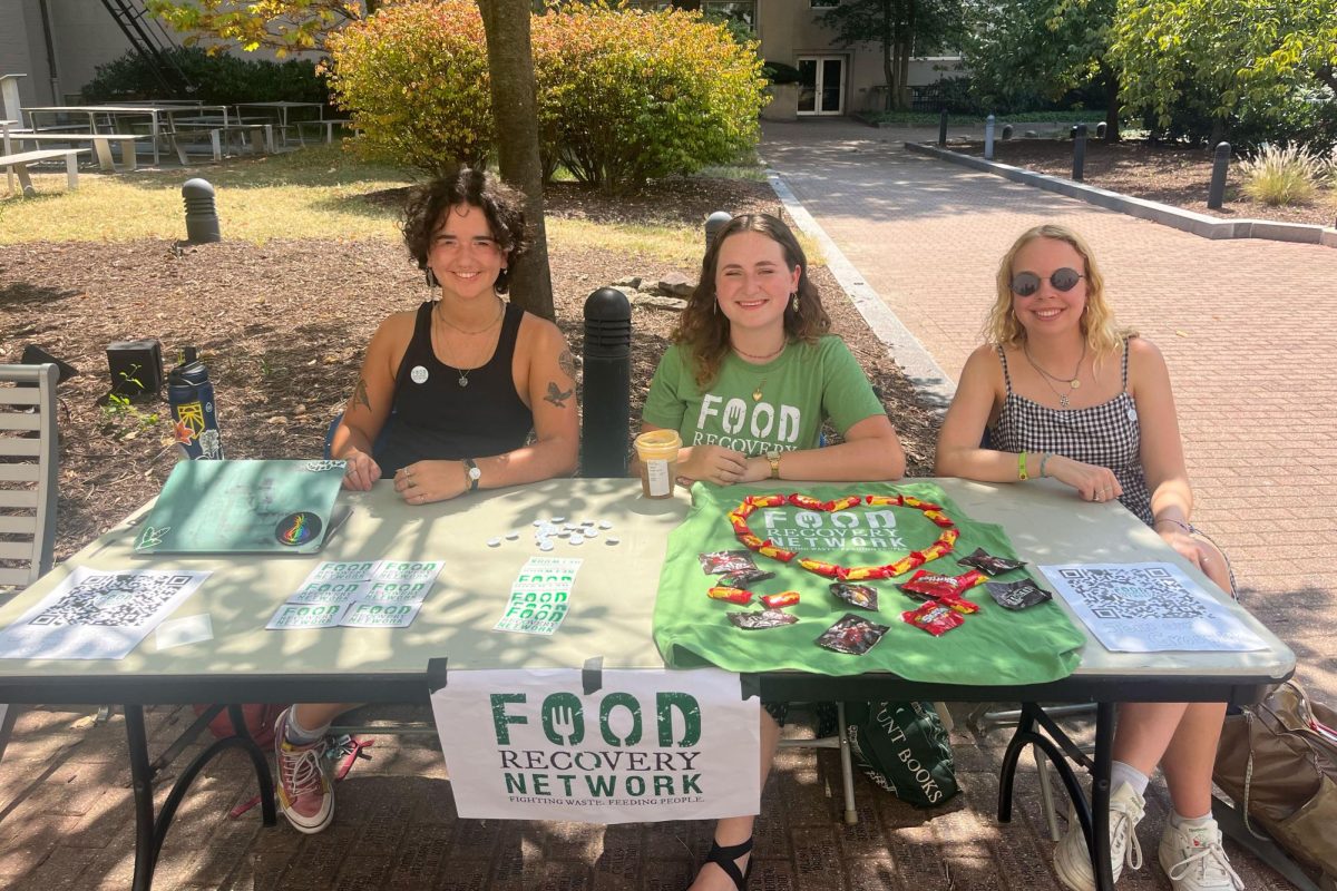 Student organizers for the GW Food Recovery Network tabling in Kogan Plaza this past week with candy and recruitment information. 