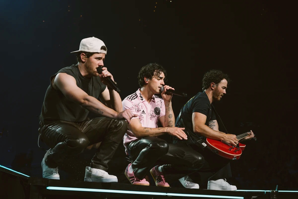 Review: Jonas Brothers bring intense, chaotic energy to Capital One