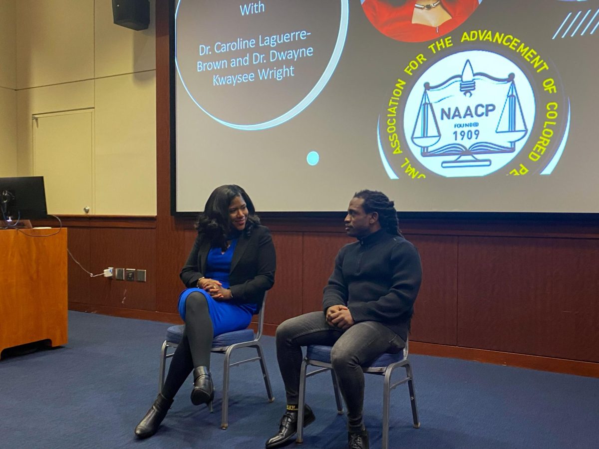 Caroline Laguerre-Brown and Dwayne Kwaysee Wright sat down for a conversation about the status of affirmative action in the University Student Center Amphitheater Monday.