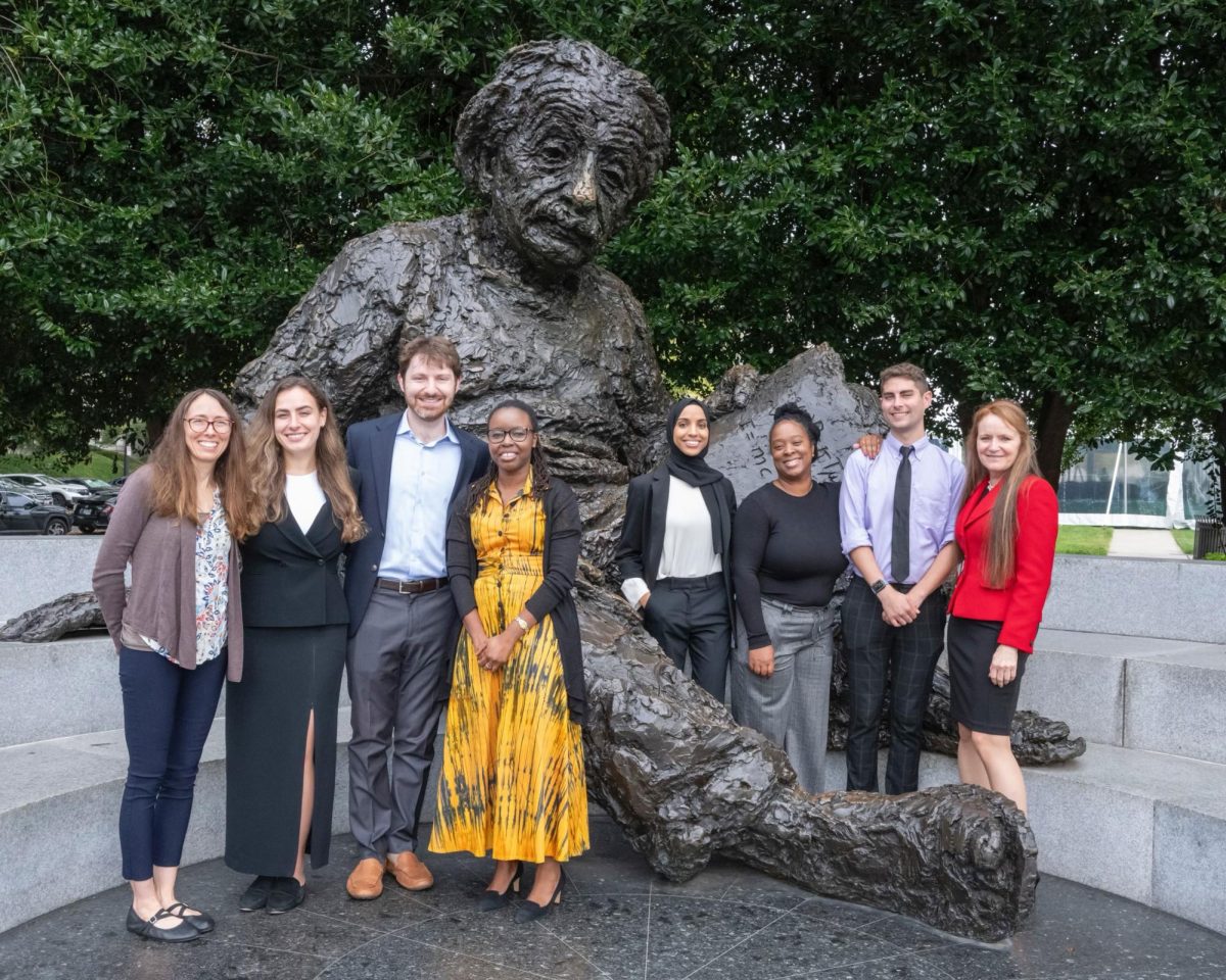 The GW student team poses in front of D.C.s Albert Einstein Memorial on Constitution Avenue.