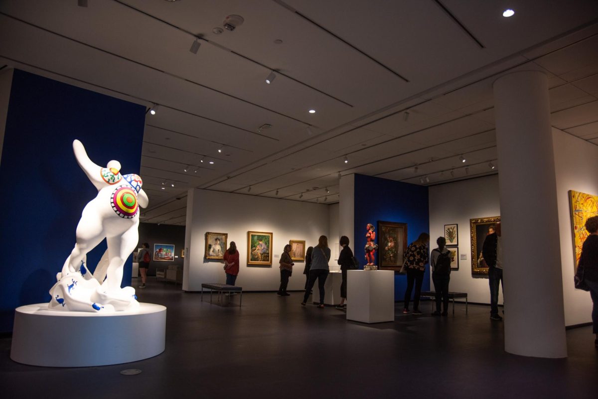 Museum-goers stroll through the National Museum of Women in the Arts exhibits, created exclusively by women and nonbinary artists.