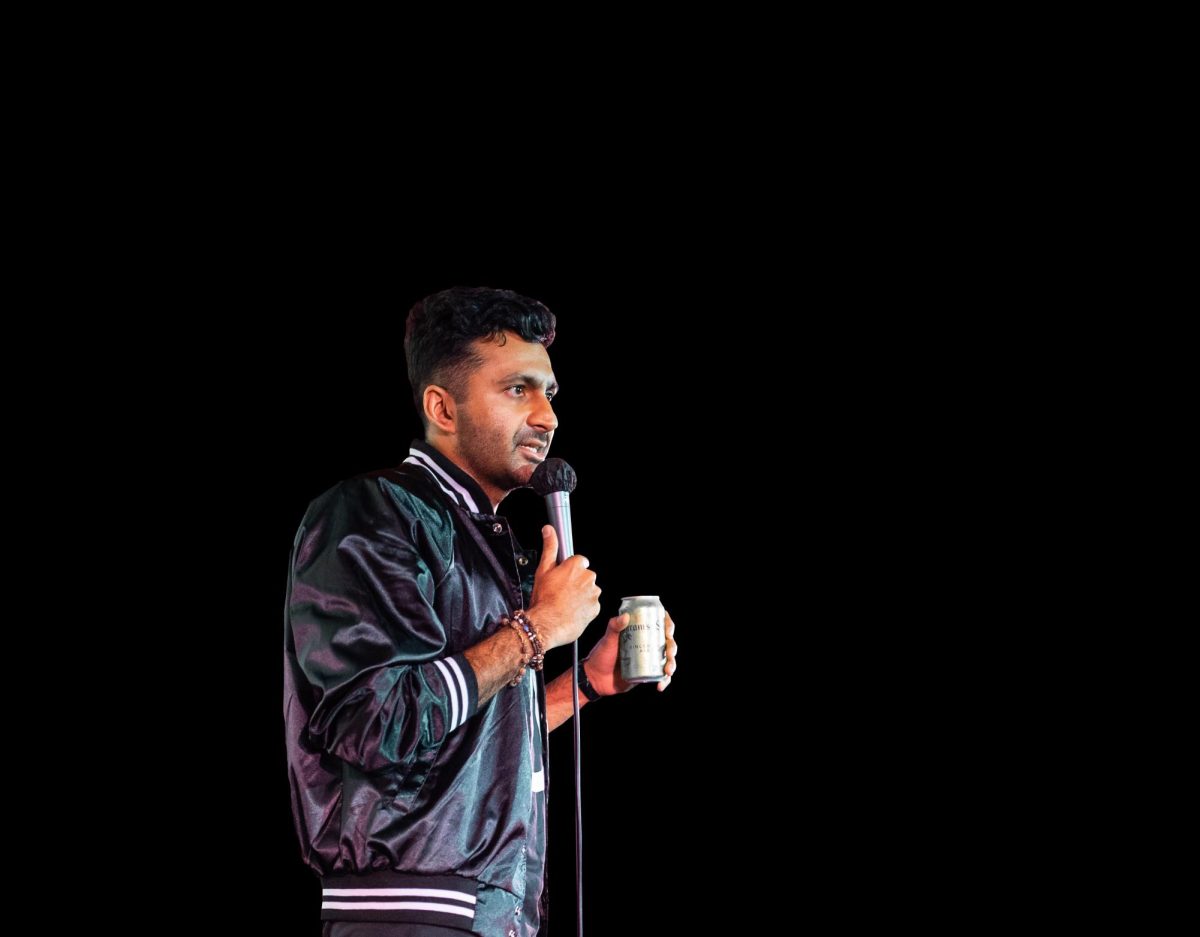 Stand-up+comedian+Nimesh+Patel+stands+onstage+to+deliver+a+set.