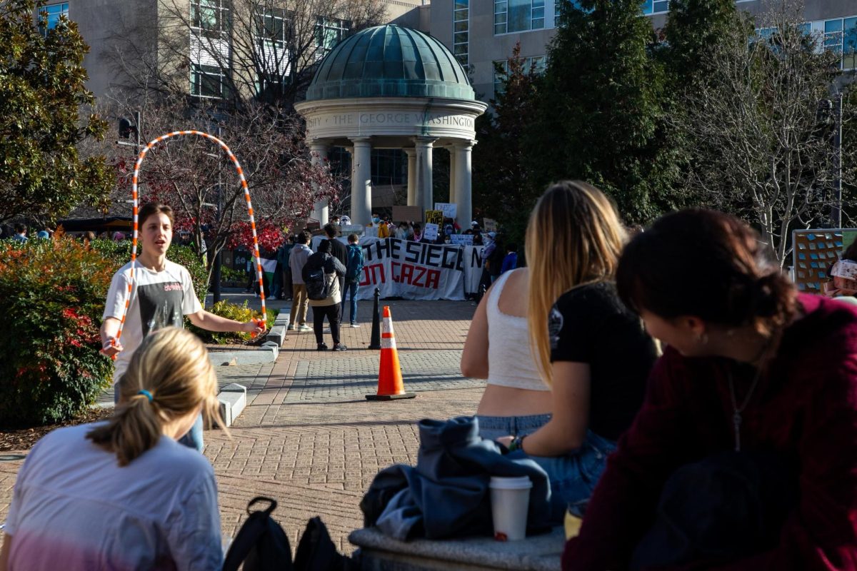 Dozens of students led a protest in Kogan Plaza on Friday demanding an end to Israels siege on Gaza while others jumped rope, ate snacks and relaxed in the sunny weather just feet away.