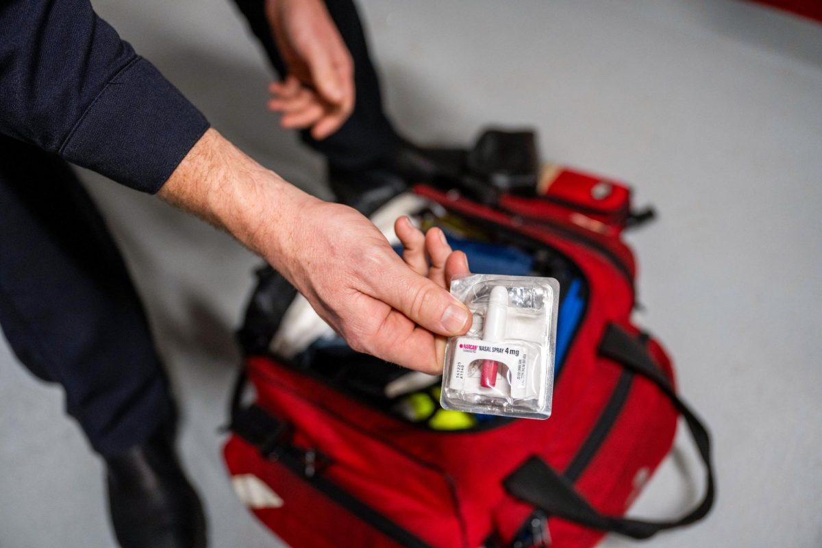 A paramedic presents a dose of Naloxone, or Narcan, a medication that rapidly reverses an opioid overdose.
