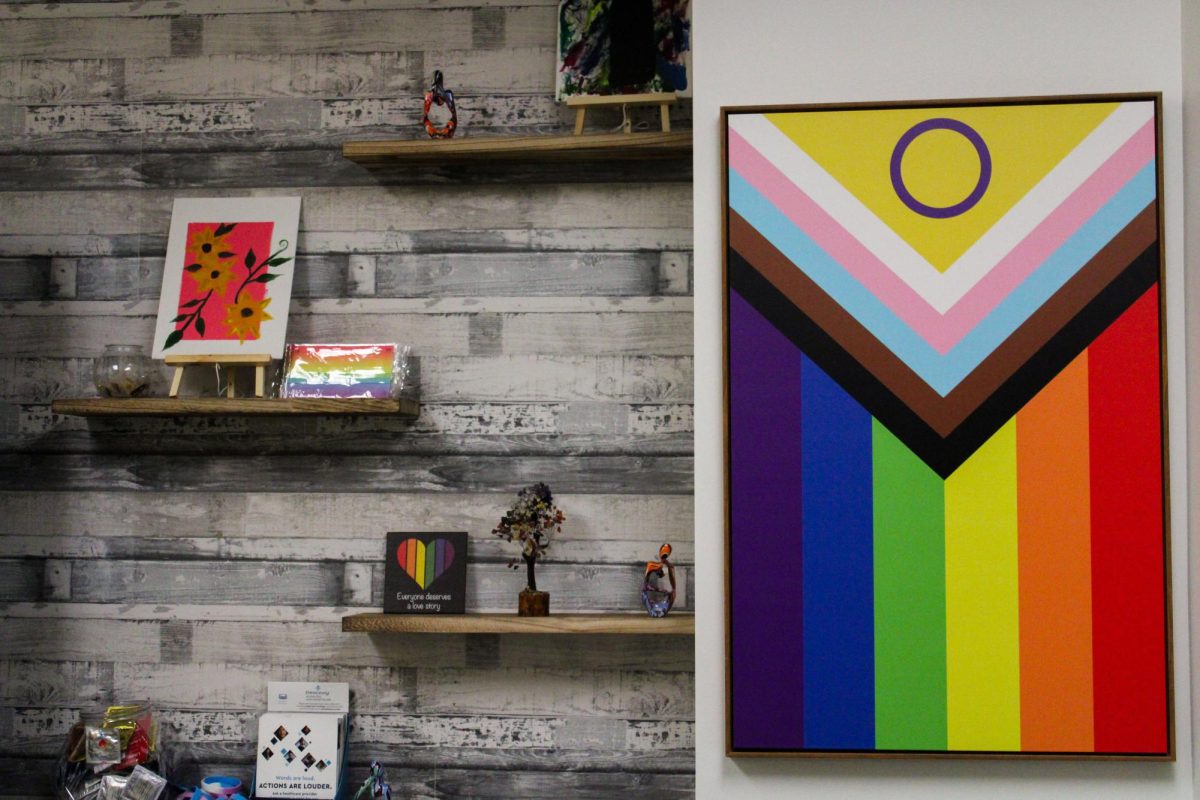 A pride flag and other decorative items adorn the wall of the MSSCs new LGBTQ+ resource room. 